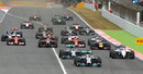 Lewis Hamilton leads Nico Rosberg down to Turn 1