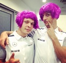 Kevin Magnussen and Jenson Button take helmet hair to a new level as they don pink numbers for 'Wig Wednesday' in support of children's cancer charity CLIC Sargent