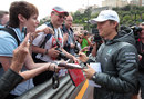 2013 race-winner Nico Rosberg signs autographs at Monaco 
