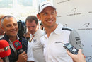 Jenson Button shares a joke with the media on Wednesday