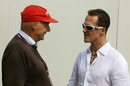 Michael Schumacher chats with Niki Lauda