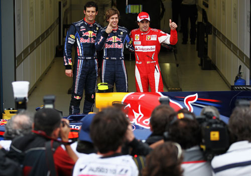 Sebastian Vettel celebrates taking pole position ahead of Mark Webber