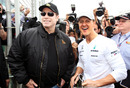 Michael Schumacher is visited by John Travolta
