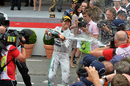 Nico Rosberg celebrates with the champagne
