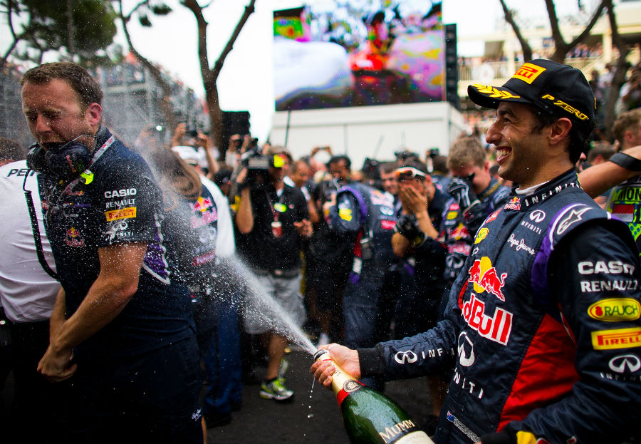 Daniel Ricciardo sprays the champagne after finishing third