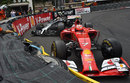 Kevin Magnussen and Kimi Raikkonen come to a stop making contact at Loews 