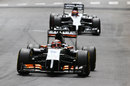 Nico Hulkenberg approaches Ste Devote with Jenson Button in his mirrors