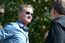 BBC pundit David Coulthard talks to Martin Brundle in the paddock