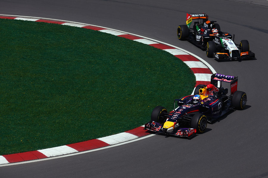 Sebastian Vettel leads Nico Hulkenberg on track