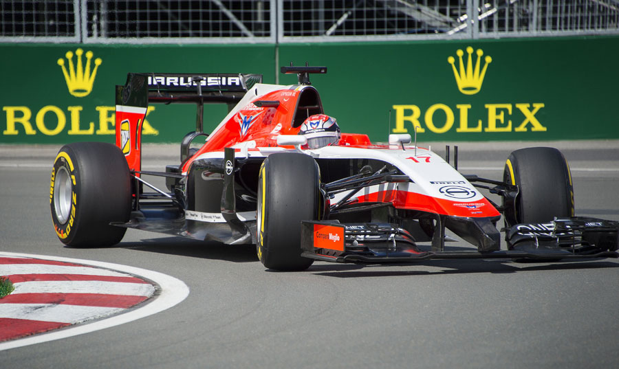 Jules Bianchi rounds the kerb at the Hairpin