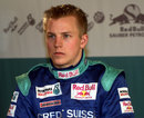 Sauber's Kimi Raikkonen looks on in the garage in Hinwill