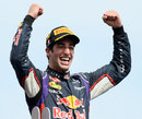 Daniel Ricciardo celebrates his maiden career victory on the podium