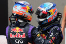 Sebastian Vettel (right) congratulates Daniel Ricciardo in parc ferme after his maiden victory