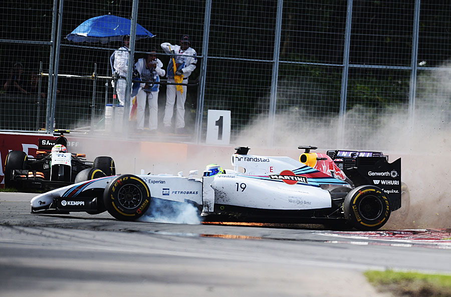 An out of control Felipe Massa crosses the path of Sebastian Vettel after making contact with Sergio Perez (rear left)
