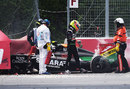 Sergio Perez walks away from his wrecked Force India