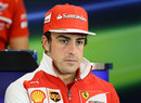 Fernando Alonso looks on in the drivers' press conference