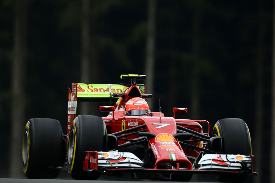 Kimi Raikkonen on track with a car covered in aero paint