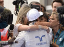Felipe Massa celebrates with his wife and son after claiming pole in Spielberg