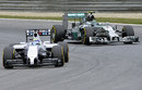 Felipe Massa leads Nico Rosberg on track