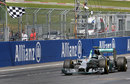 Nico Rosberg crosses the line to take his third victory of the season