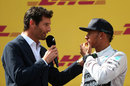 Mark Webber interviews Lewis Hamilton on the podium 