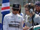 Lewis Hamilton talks with race engineer Peter Bonnington on the grid