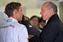 Jenson Button in discussion with Ron Dennis in the paddock