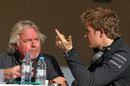 Nico Rosberg talks to his father Keke