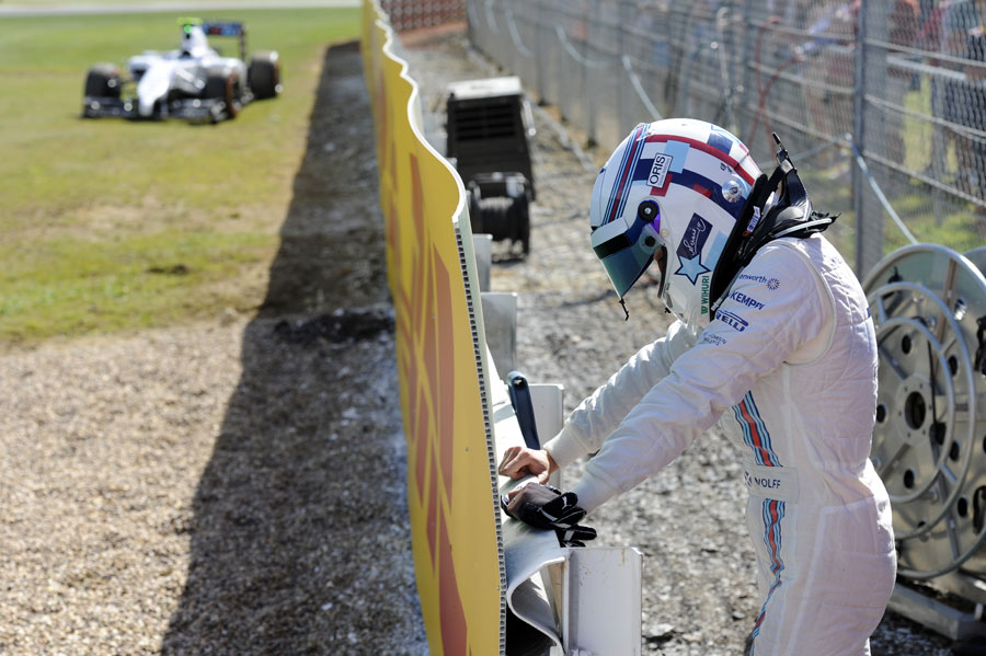 Susie Wolff shows her disappointment after her Williams broke down on her debut F1 session 