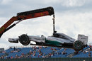 Lewis Hamilton's Mercedes is lifted off the track