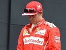 Kimi Raikkonen returns to the paddock after being eliminated from Q1