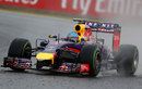 Sebastian Vettel romps through the spray in qualifying