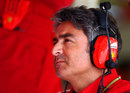 Marco Mattiacci watches on from the Ferrari garage