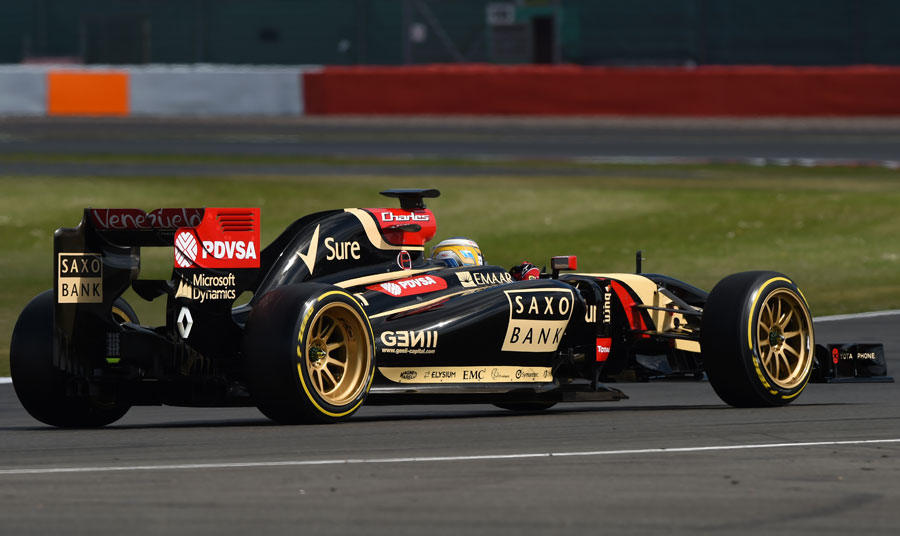 Charles Pic on track in the Lotus, fitted with 18-inch wheels