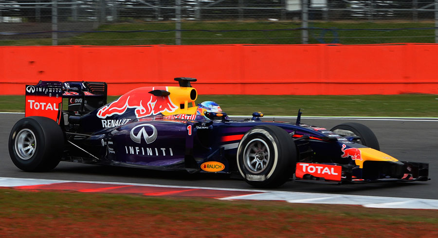 Sebastian Vettel puts his Red Bull and its test Pirelli tyres through their paces