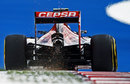 Sparks fly from the rear of Daniil Kvyat's Toro Rosso