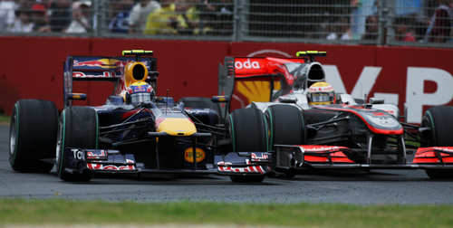 Mark Webber and Lewis Hamilton go wheel to wheel