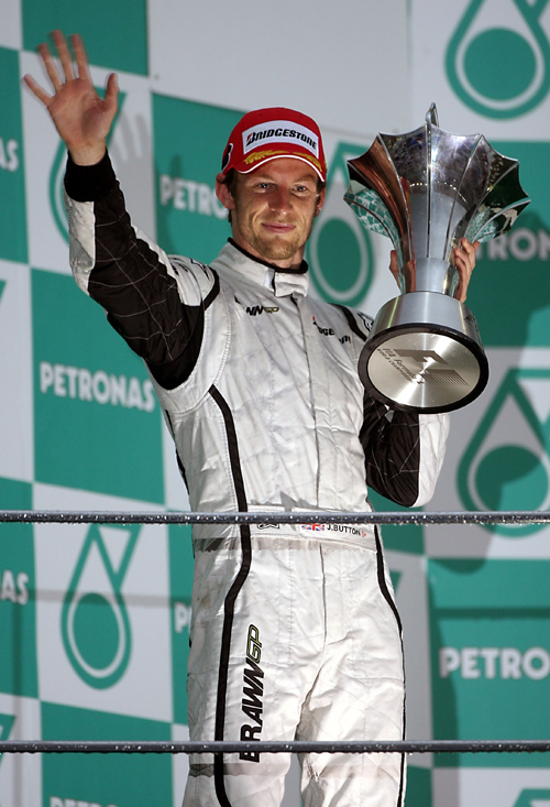 Slightly muted celebrations from Jenson Button