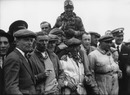 Tazio Nuvolari being carried shoulder high after winning the Ulster TT