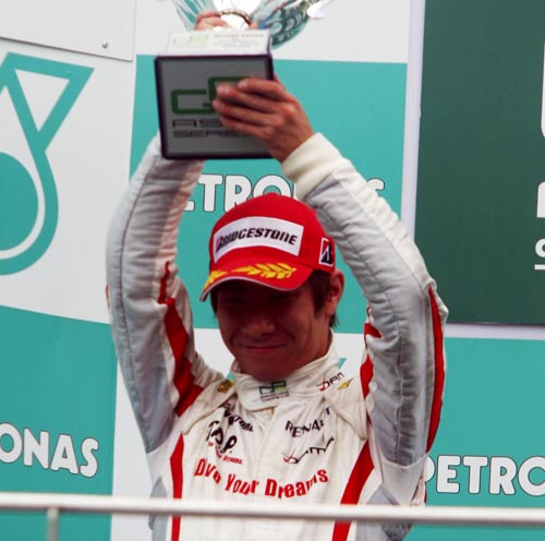 Kamui Kobayashi  celebrates his second position in the GP2 Asia Series at Sepang in 2009