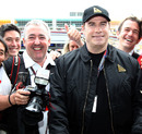 Photographer Mark Sutton with John Travolta