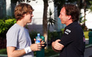 Sebastian Vettel chats with Red Bull boss Christian Horner