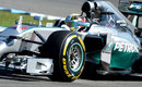 A close-up of Lewis Hamilton on track during Friday practice
