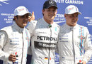 Nico Rosberg is flanked by the Williams drivers in parc ferme after qualifying