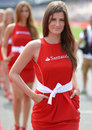 A grid girl on track before the race