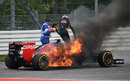 Daniil Kvyat jumps from his flaming Toro Rosso at Turn 6