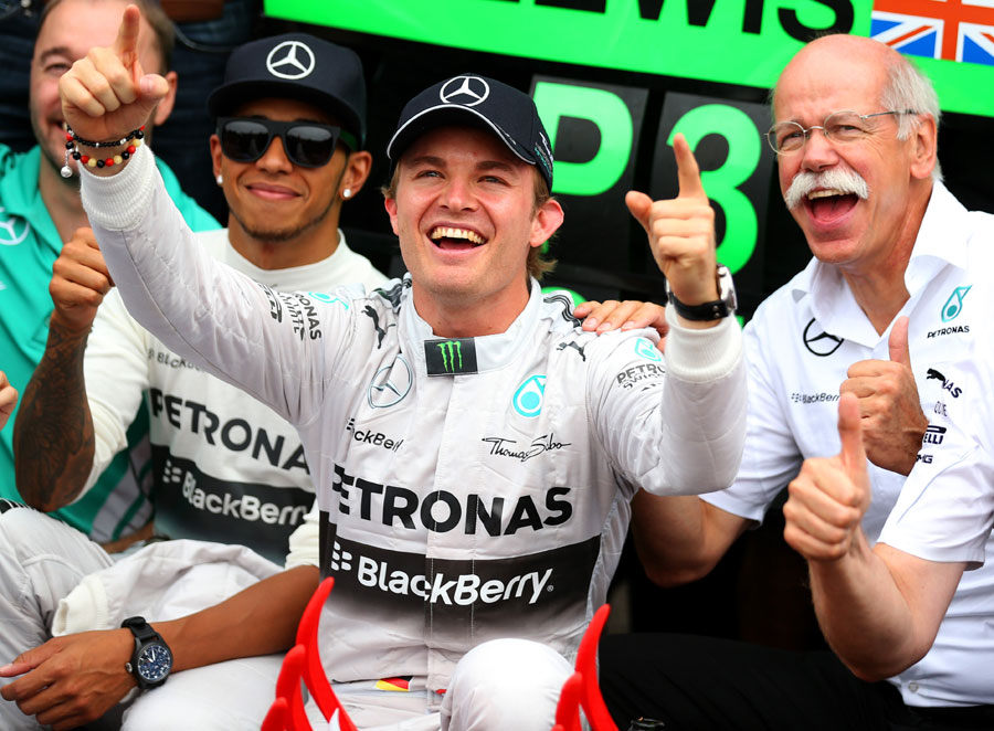 Nico Rosberg celebrates victory with the Mercedes team