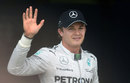 Nico Rosberg waves to the crowd after securing his sixth pole of the season