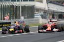 Daniel Ricciardo makes the crucial pass on Fernando Alonso for the lead