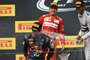 Lewis Hamilton sprays race-winner Daniel Ricciardo on the podium